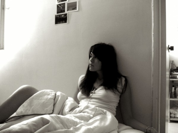 Woman sitiing in bed